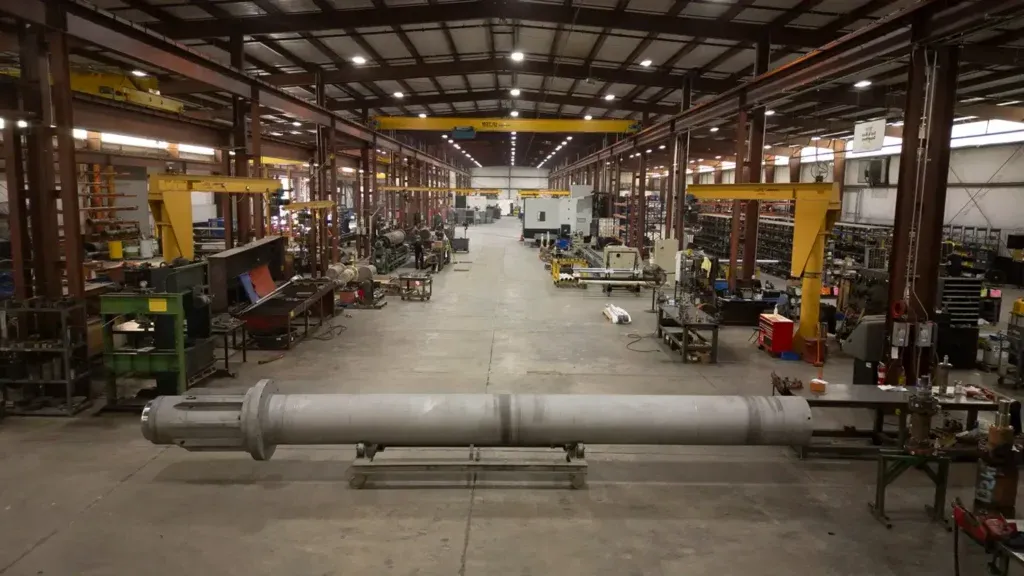 View of Alabama facility with large gray mill duty cylinder